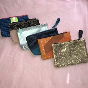 Six Ipsy Bags